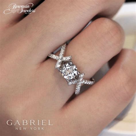 Give her Hugs & Kisses that she can flaunt. This XOXO Diamond Engagement Ring from Gabriel i ...