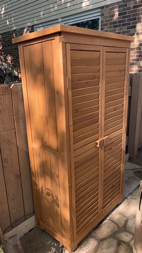 Outdoor Wooden Garden Tool Storage Cabinet - Costway