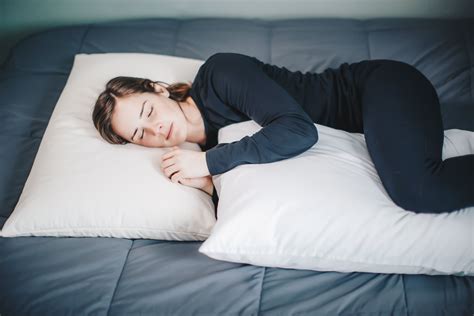 Set yourself up to sleep well at night by using pillows to support your whole body - not just ...