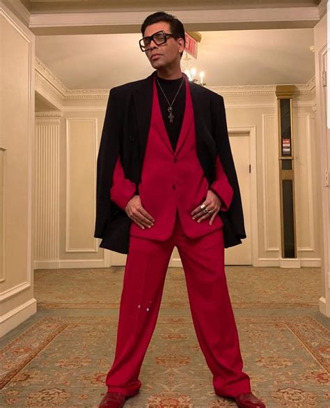 Karan Johar Heads for Emmy Awards in New York in a Red Suit - Masala