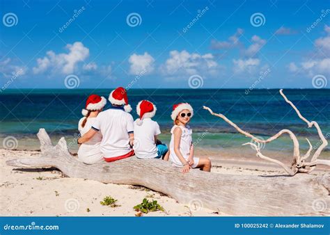 Family at Beach on Christmas Stock Photo - Image of holiday, girl: 100025242