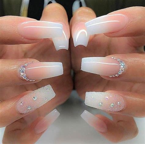 bridal manicure idea, long coffin-style nails, with pink and white ombre-like nail polish ...