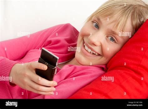 Young Girl Reading Text Message Stock Photo - Alamy