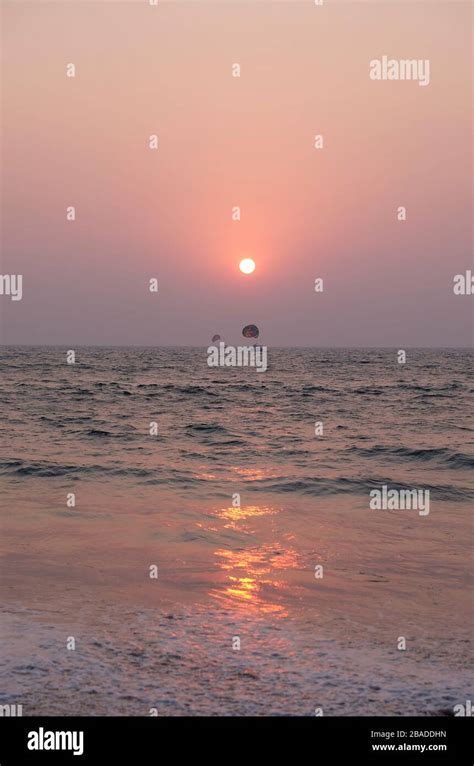 Sunset at Candolim Beach, North Goa, India Stock Photo - Alamy