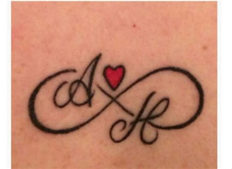Pin by Humad Kh on logo | Tattoos for women small meaningful, Initial tattoo, Small wrist tattoos