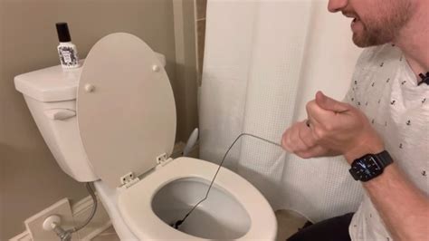 Our Plumbing Expert Weighs In On Using A Hanger To Unclog Your Toilet In A Pinch