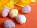 Mini sugar-coated Easter quail eggs on orange Creative Commons Stock Image
