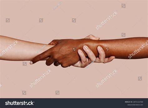 People of different races holding hands Images, Stock Photos & Vectors | Shutterstock