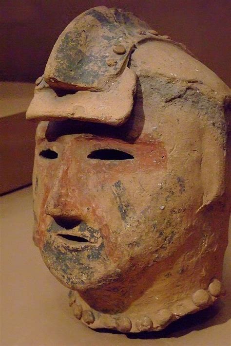 Haniwa in the form of a warrior's head Kofun period (300-552 CE) Japan ...