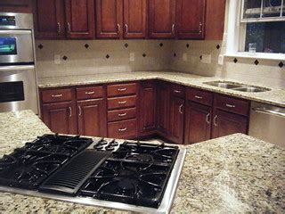 Granite Installation, Santa Cecilia Countertop, and Tile B… | Flickr