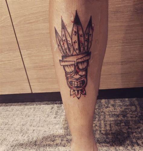 Aku-Aku Tattoo | Leg tattoos, Tattoos, Aku aku tattoo