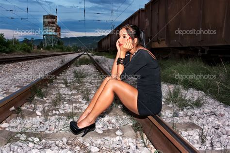 Woman on railway tracks — Stock Photo © joycedragan #30408445