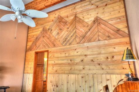 Paneling in the shape of mountains! | Estate interior, Mountain homes, Wall treatments