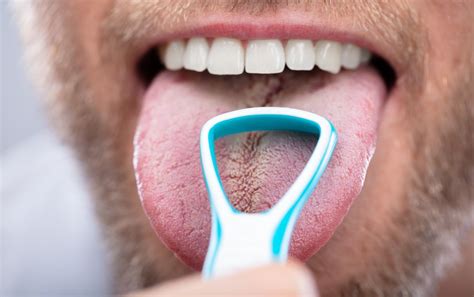 Tongue Scraping: 4 Benefits & How To