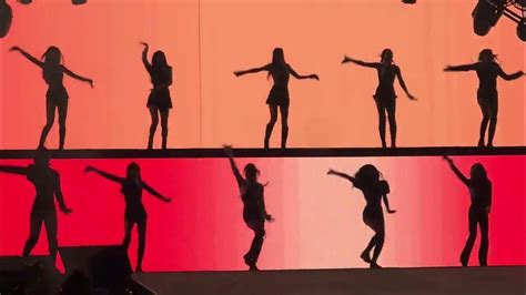 the silhouettes of people are dancing on stage