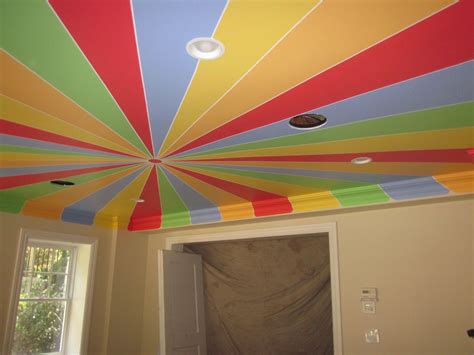 Do something like this in the girls' room using the different ceiling angles as guidelines ...