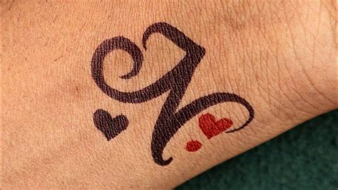 Top 83+ n letter tattoo designs on hand best - in.eteachers