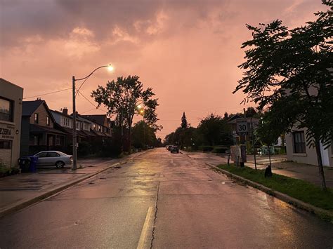 Red sky minutes before a storm hit : r/weather