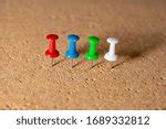 Image of Colored Map Pins on Brown Cork Board | Freebie.Photography