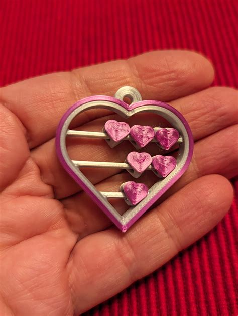 Dancing Hearts Pendant by GeekMomProjects | Download free STL model | Printables.com