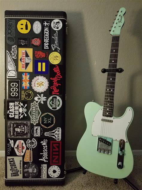 Committed some of my sticker collection to a guitar case : guitarporn