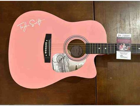 Taylor Swift Signed Guitar | BiddingForGood