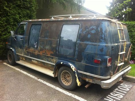 This creepy van has been parked in my guest parking for a few days now ...