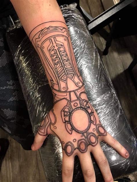 Amazing Infinity gauntlet tattoo. Done by Jaki at Revelation Tattoo in Orange Park FL. Pic ...