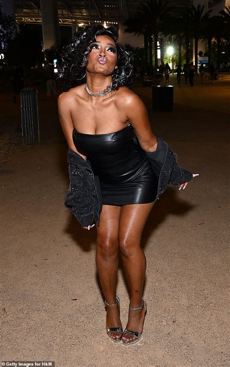 Keke Palmer puts on a leggy display in a black strapless latex dress at ...