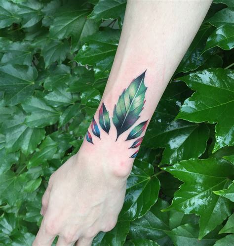 Gorgeous green leaves tattoo - Tattoogrid.net