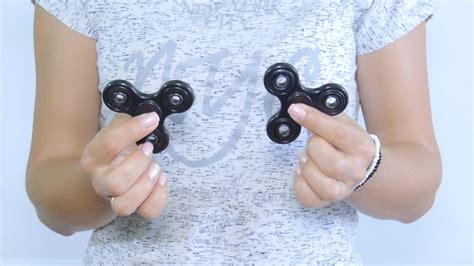 5 Ways to Do Fidget Spinner Tricks - wikiHow