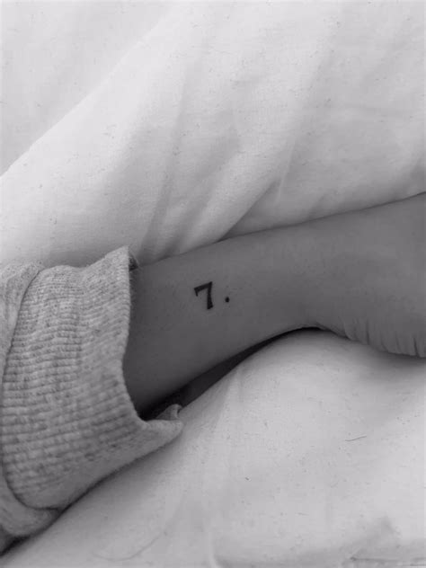 Lucky number 7 tattoo on wrist | Bts tattoos, Tattoos, 7 tattoo