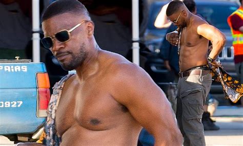 Jamie Foxx shows off his muscular physique after push ups on the set of new Netflix movie Power ...