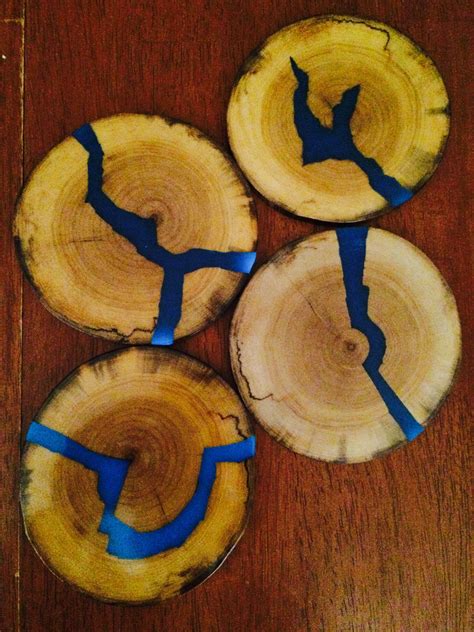 Wood coasters with blue glowing resin inlays | Resin crafts, Diy resin ...