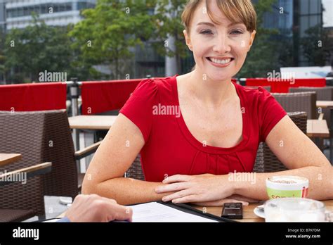office workers outside drinking coffee Stock Photo - Alamy
