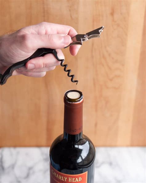 How To Open a Bottle of Wine Using a Wine Key Corkscrew | The Kitchn