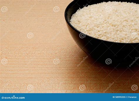 Black Bowl with White Rice,Orange Background Stock Image - Image of ...