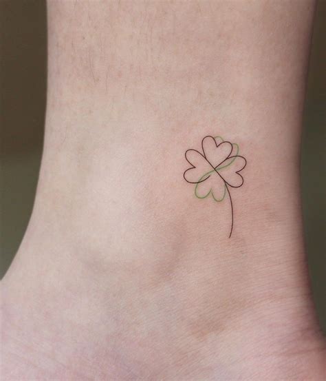 Four-leaf Clover Tattoos: What They Mean & Why They're So Popular | Clover tattoos, Shamrock ...