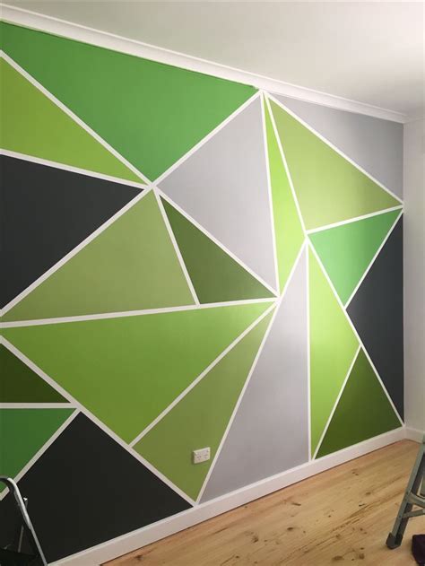 Mr 14's bedroom with a new painted feature wall | Painted feature wall, Geometric wall paint ...