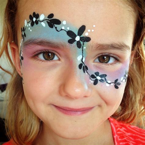 Face painting - simple black and white flower branch with coloured base. | Face painting flowers ...