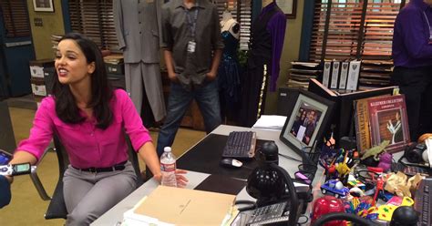 Melissa Fumero, aka Detective Amy Santiago, sat at her desk and | Here's All the Cool Stuff We ...