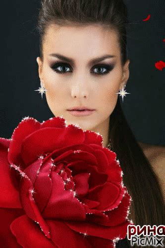 a woman with long hair holding a red rose