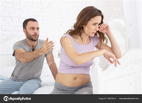 Sad pregnant woman crying Stock Photo by ©yacobchuk1 199276574