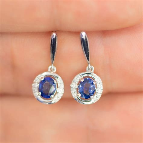 Natural Blue Sapphire And Diamond Drop Earrings In 18K White Gold