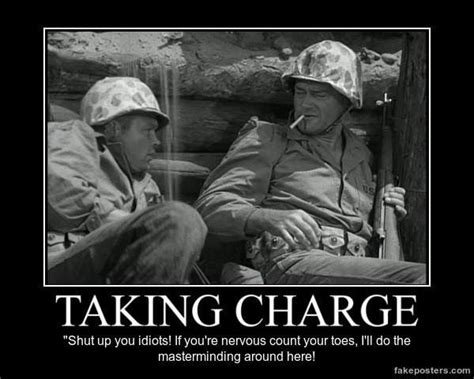 two men sitting next to each other in front of a sign that says taking charge