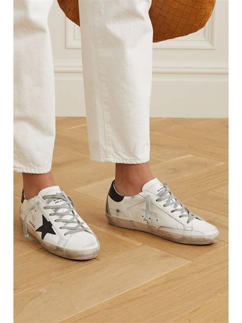 White Superstar distressed leather sneakers | GOLDEN GOOSE | NET-A-PORTER