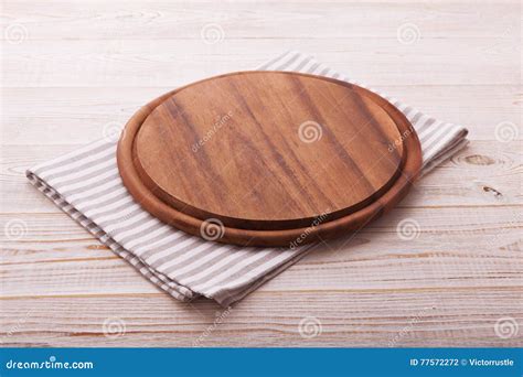 Pizza Board with Napkin on Wooden Table. Top View Mockup Stock Photo ...