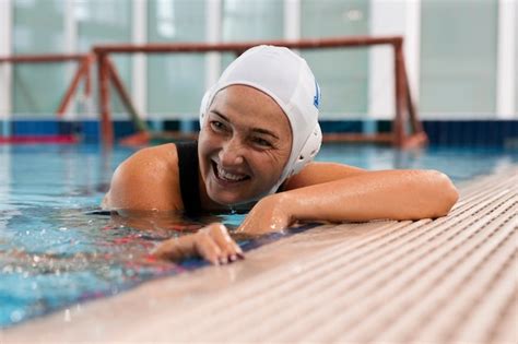 Free Photo | Water polo player at the pool with swimming equipment