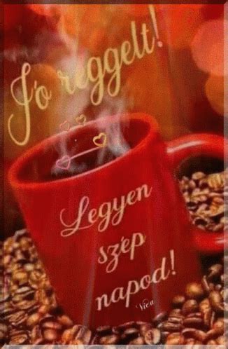 a red coffee mug sitting on top of a pile of coffee beans with the words, for