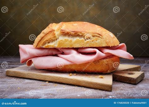 Italian Mortadella Sandwich on Wooden Cutting Board Stock Photo - Image of roll, wood: 176820028